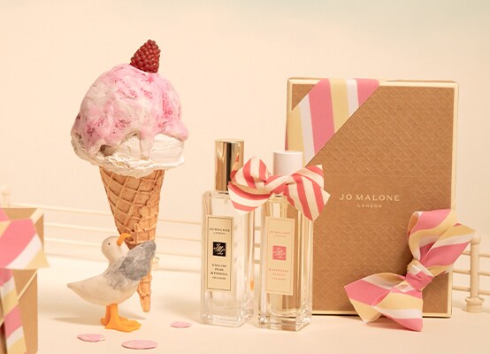 A stop motion videos shows a seagull carrying an icecream cone that drips alongside two Jo Malone London cologne bottles. 